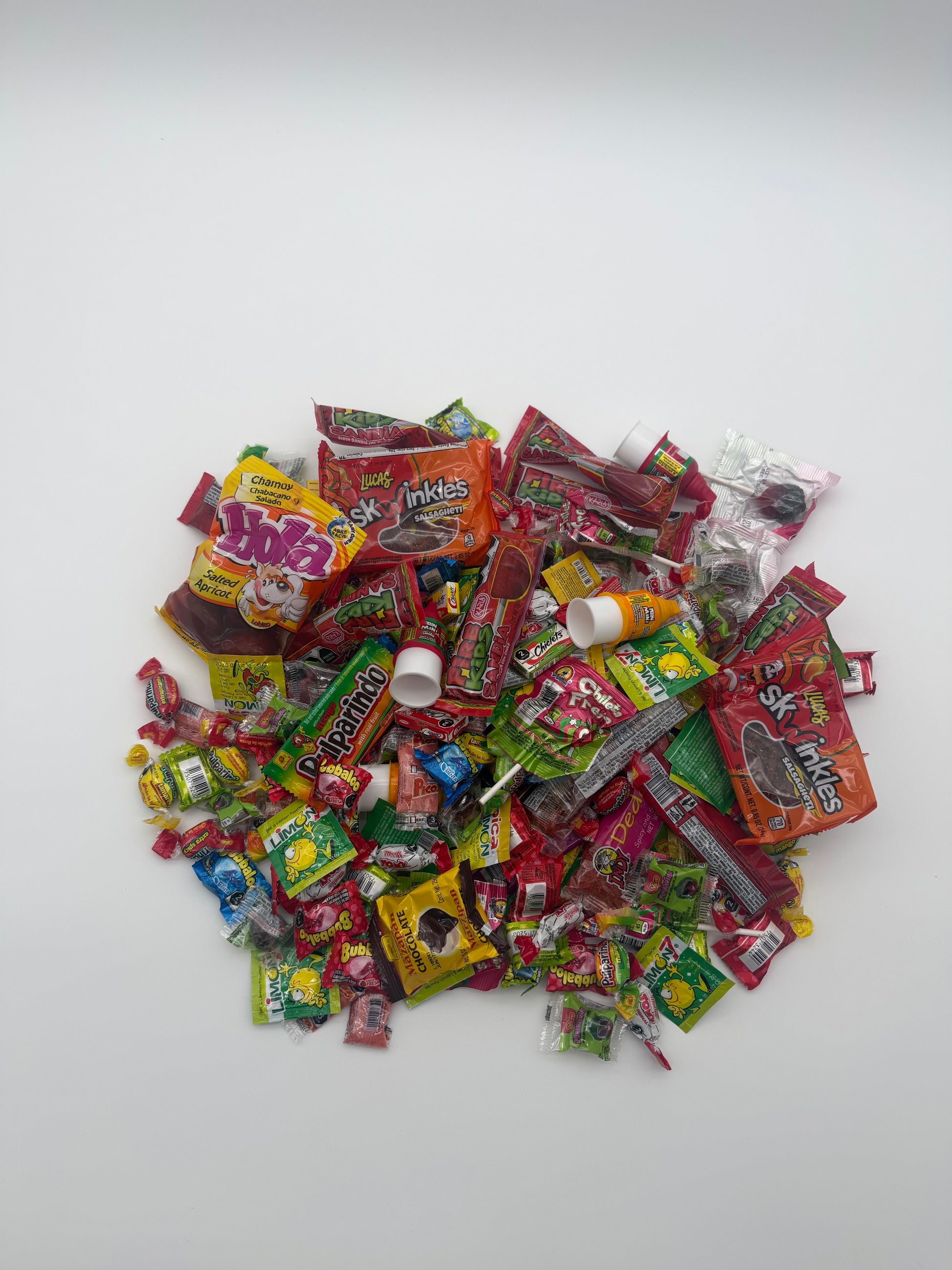 Mexican candy bundles with assorted sweet and spicy Mexican candies in boxes
